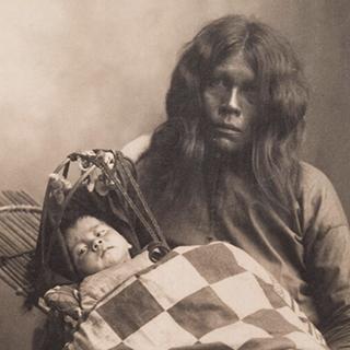 A Caddoan Woman and baby photographed in 1898